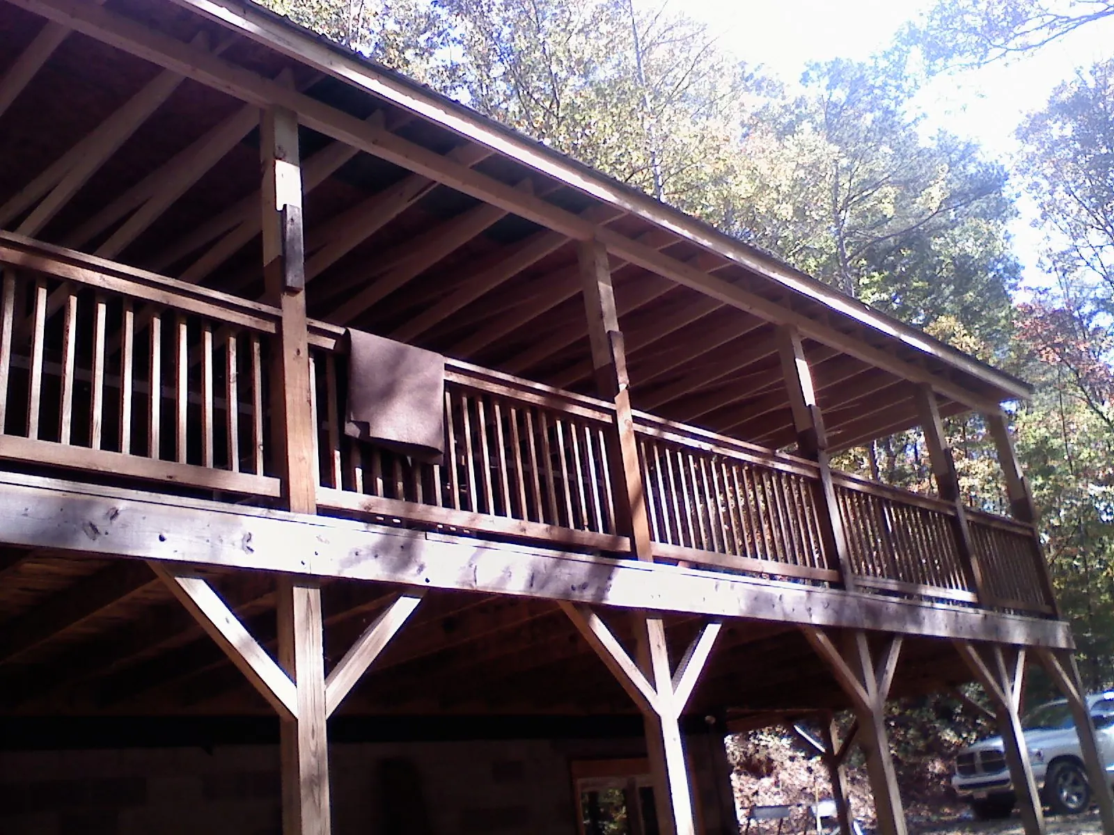 Timber framing under a new elevated porch and deck — Roof Leak Repair in Gaithersburg by Roofing Brothers